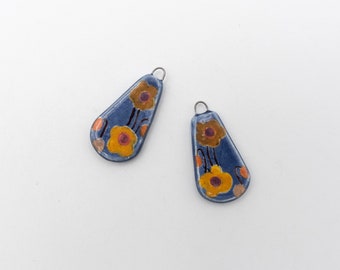 Glazed ceramic floral charms, hand decorated jewelry accessories, porcelain flower pendants.