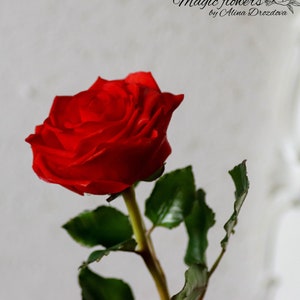 Red rose artificial flower out of cold porcelain