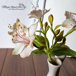 White alstroemeria artificial flower out of cold porcelain