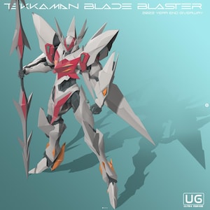 May include: A digital illustration of a Tekkaman Blade Blaster robot. The robot is primarily white, with red and gray accents. It holds a spear and has a large wing-like structure on its back. The text "TEKKAMAN BLADE BLASTER" and "2023 YEAR END GIVEAWAY" are visible.