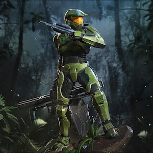 May include: A detailed figurine of a soldier in green and black armor, holding a rifle. The figure stands in a jungle setting, with lush green foliage and a blurred background. The soldier's helmet has an orange visor.