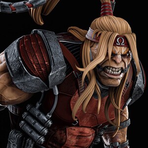 May include: A detailed, close-up of a muscular action figure with long blonde hair and a red headband. The figure wears a red and gray armored suit with a menacing expression. The figure has a headset and the Greek letter Omega on the headband.