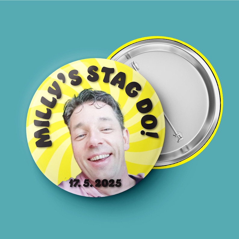 May include: A round pin-back button featuring a yellow and white spiral background. The text "MILLY'S STAG DO!" is printed in black along the top, with the date "17. 5. 2025" at the bottom. A photograph of a smiling person is centered.