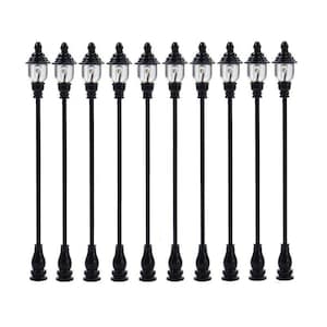 May include: A collection of ten miniature black street lamps. Each lamp features a clear, rounded light fixture with a small bulb, atop a slender black pole. The lamps are designed for decorative purposes.