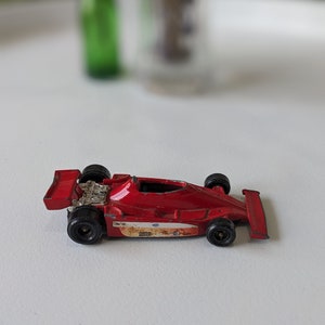 Raro coche de carreras Ferrari 312 T3 rojo vintage, juguete coleccionable fabricado en Hong Kong, coche de juguete de exhibición