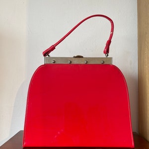 Shiny red purse shop