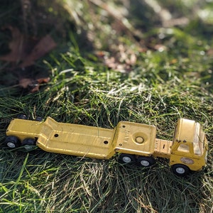 Vintage Tonka truck and trailer flatbed semi style rare to ka yellow metal vintage Tonka toy rare home decor display vintage metal toys