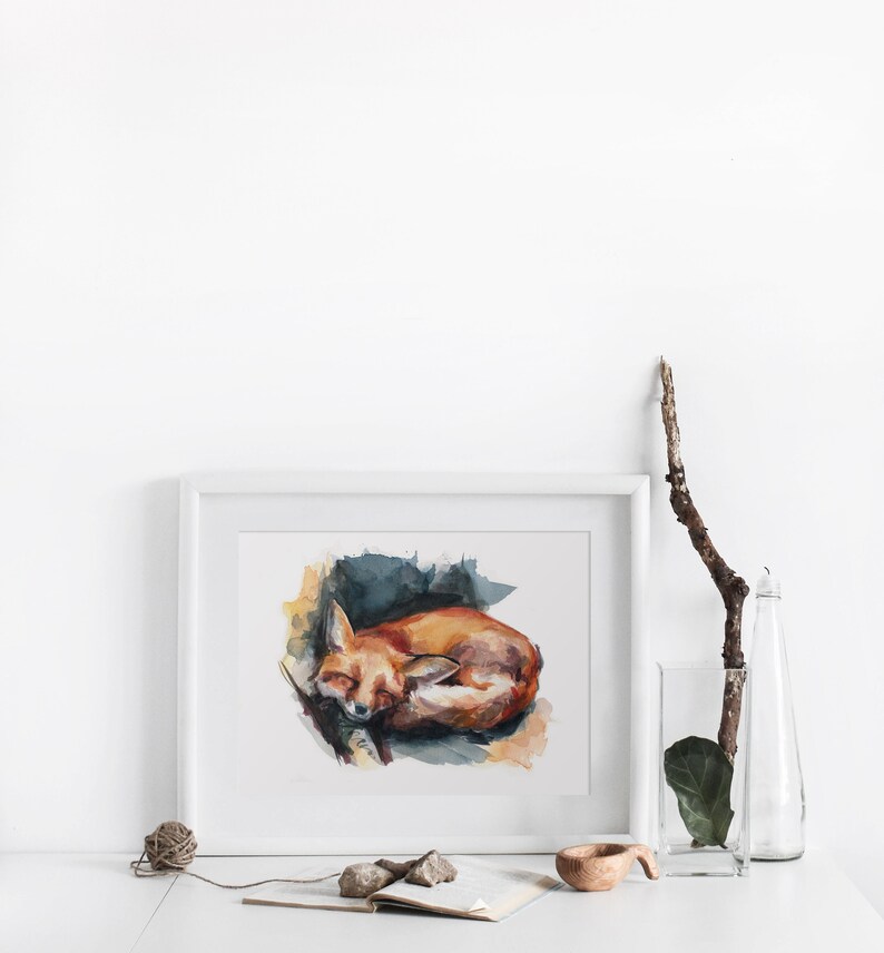 May include: A watercolor painting of a curled up fox sleeping in a forest setting. The fox is painted in shades of orange and brown, with a white chest and a black nose. The background is a soft blue and green, with hints of yellow.