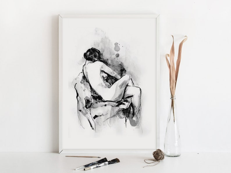 May include: Black and white ink drawing of a nude figure sitting on a stool. The drawing is framed and displayed on a white wall.