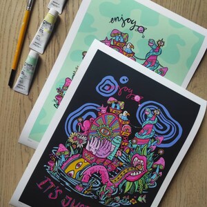 May include: A black and white print featuring a colourful illustration of a psychedelic scene with a wheel of fortune, a pink octopus, and a snake. The text "It's just a ride" is written in white at the bottom of the print.