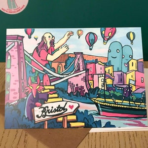 Cartão das criaturas de Bristol 2. Ponte de suspensão e Goram de Giant pelo rio de Avon.