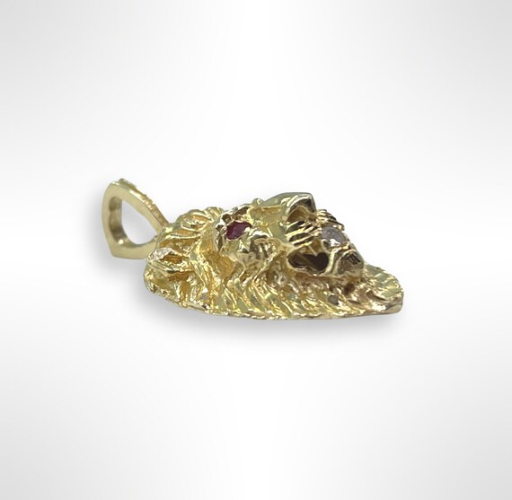 Gold lion pendant with ruby eyes Clearance