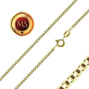 May include: A gold chain necklace with a box chain design. The chain is made of 14k gold and is 20 inches long. The chain has a lobster clasp closure. The chain is made in Italy.