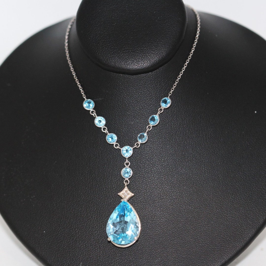 9ct White Gold 1.90ct Elongated Pear Cut Blue Topaz and Diamond Pendant