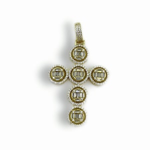 May include: A gold cross pendant with a circle of baguette diamonds around each of the five stones. The pendant is on a white background.