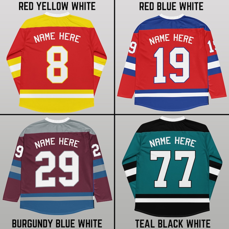 May include: Four different hockey jerseys with different color combinations. The jerseys are red with yellow and white stripes, red with blue and white stripes, burgundy with blue and white stripes, and teal with black and white stripes. Each jersey has a white number on the back with the text "NAME HERE" above the number.