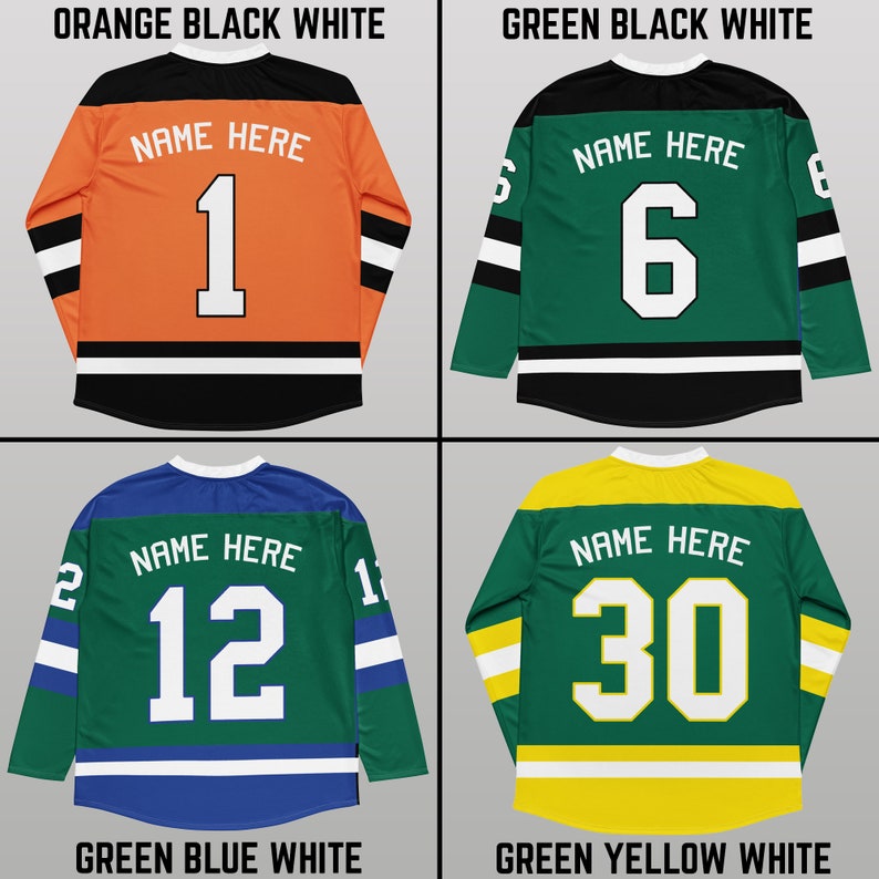 May include: Four hockey jerseys with different color combinations. The jerseys are all white, black, and green, with a fourth color that varies. The jerseys have the text "NAME HERE" and a number on the back. The numbers are 1, 6, 12, and 30.