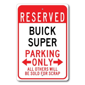 May include: Red and white metal sign with the text "RESERVED BUICK SUPER PARKING ONLY" and arrows pointing left and right. The text "ALL OTHERS WILL BE SOLD FOR SCRAP" is below the arrows.