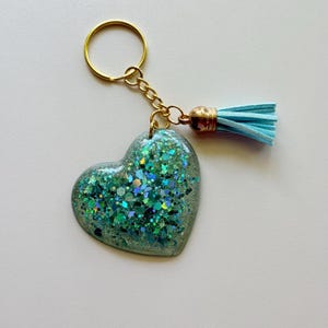 Teal glitter resin heart keychain