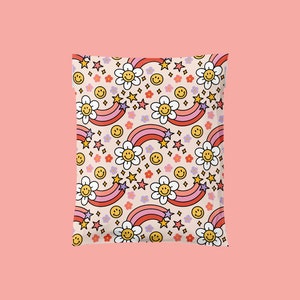 May include: A poly mailer bag with a repeating pattern of smiling flowers, rainbows, stars, and smiley faces. The design features a retro color palette of pink, red, yellow, and purple on a beige background. The bag is sealed and ready for shipping.