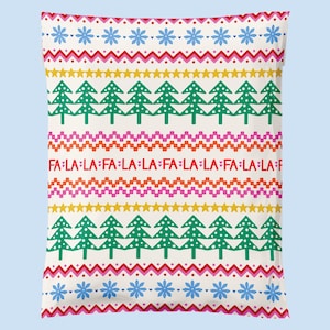 May include: A white pillowcase with a colorful Christmas-themed pattern. The design includes rows of green Christmas trees, red text that says "FA LA LA", and various geometric shapes in pink, yellow, and blue.