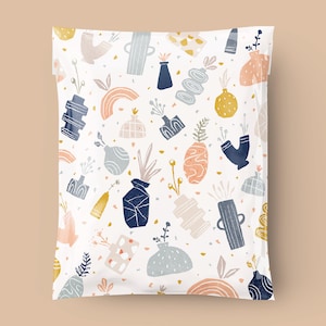 May include: A white background with a repeating pattern of blue, pink, and yellow vases with flowers and leaves. The pattern is abstract and modern.