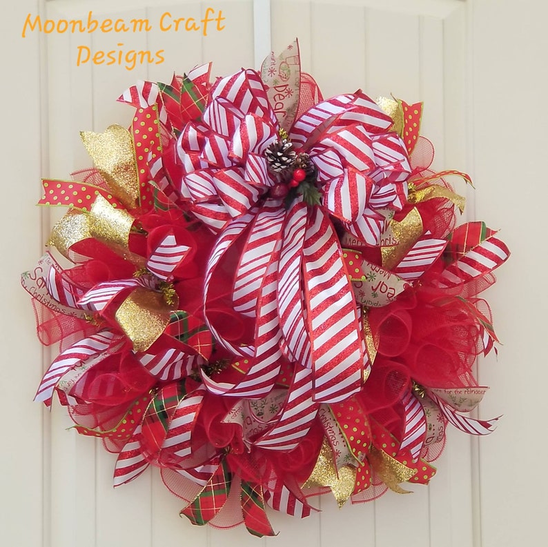 Deco Mesh Wreath With Large Red And White Bow Image 0