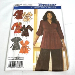 May include: A Simplicity sewing pattern envelope, number 3697, for the Khaliah Ali Collection. The front displays illustrations of six different tunic top variations and a photograph of a model wearing a long-sleeved, dark maroon tunic top.