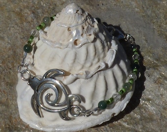 8" flexible wire shades of green glass and stone beaded bracelet with botanical moss agate and a silver turtle charm