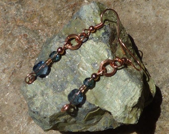 Montana blue and copper glass and metal dangle drop earrings on raw copper wire with copper ear wires