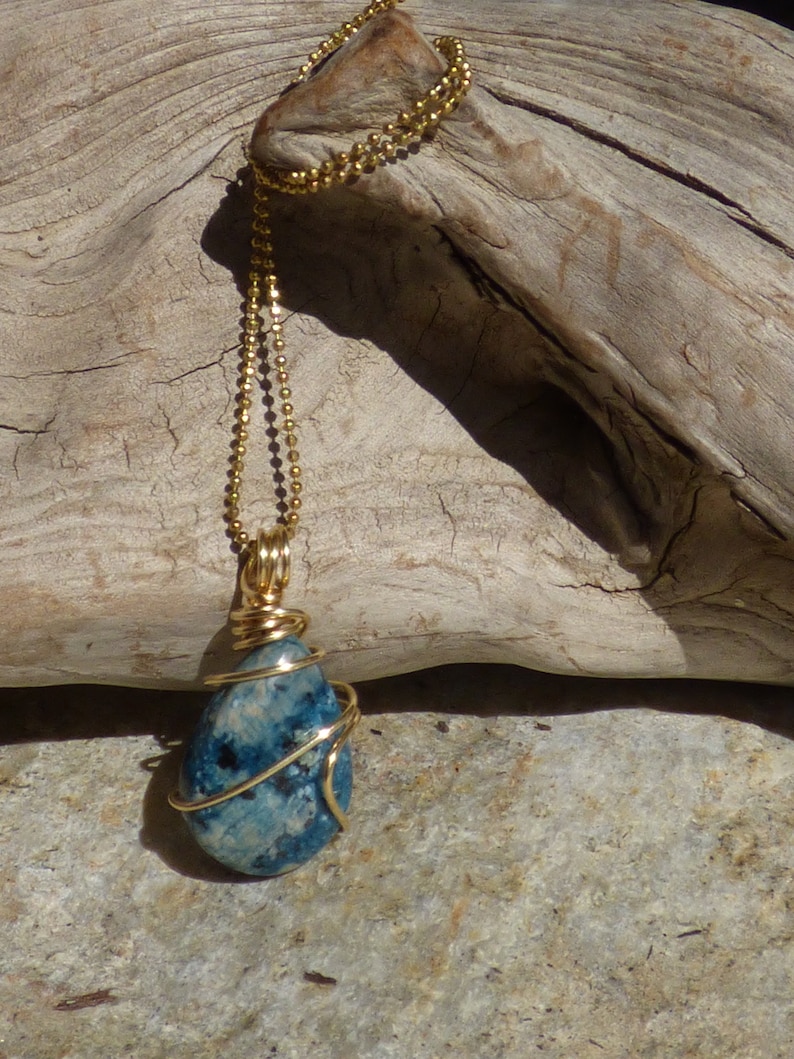 Petite sky blue cherry jasper tear drop wire wrapped pendant in raw brass with an 18 brass ball chain