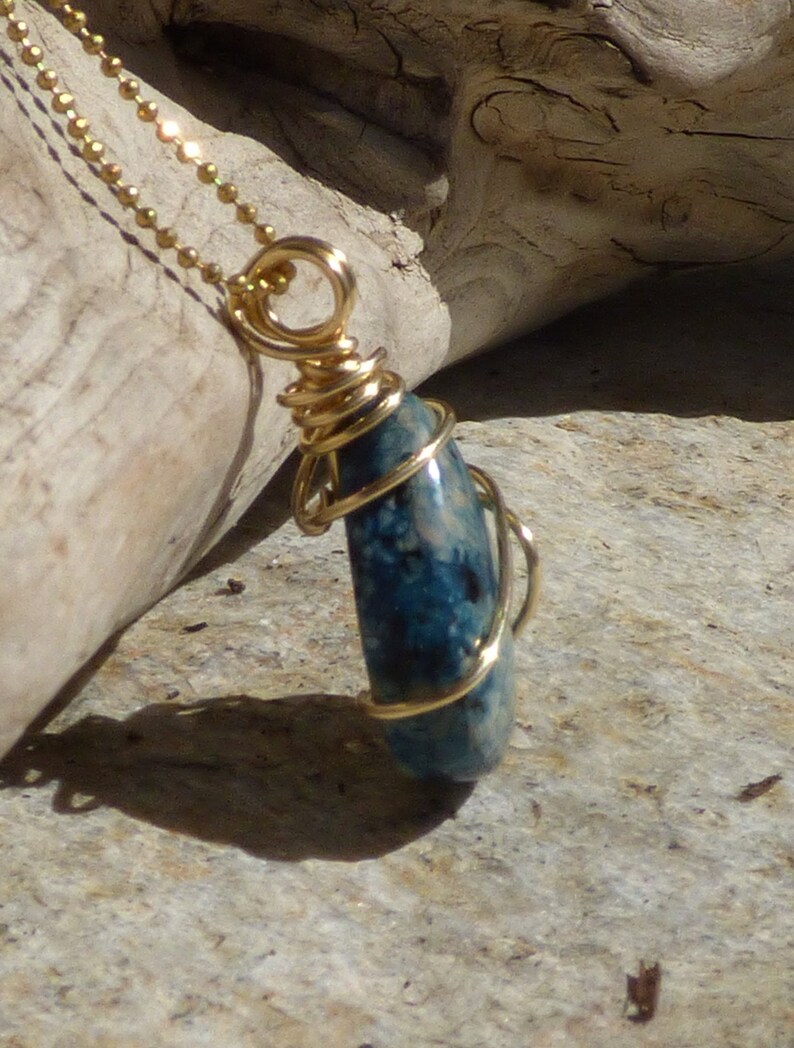 Petite sky blue cherry jasper tear drop wire wrapped pendant in raw brass with an 18 brass ball chain
