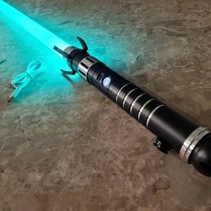 Color Changing Lightsaber with Sound – "Hela Saber" Extremely Durable, Aluminum Hilt, Rounded Shaped Emitter, RGB, Star Wars Bossaber