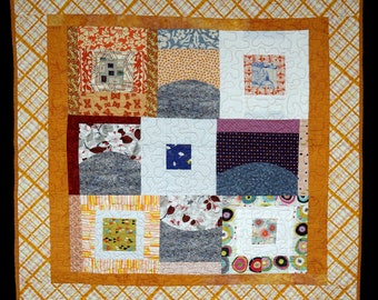 Scrap-bag baby quilt,"Orange Crush".