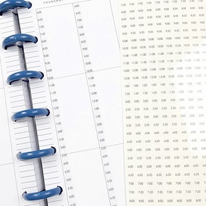 May include: A white planner with blue rings and a daily schedule from 6:00 AM to 8:00 PM. The planner has the dates 16, 17, and 19 printed on the top. The text "Show Your Magic To The World" is printed at the bottom of the page.