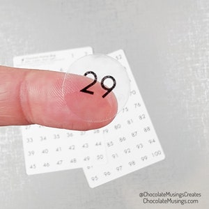50 circular stickers (1 sheet) of any specified number or alphabet character (specify in contents) - cut to .7 Inch (3/4&quot;) size