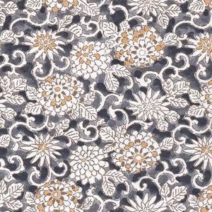 May include: A seamless pattern featuring white and gold chrysanthemum flowers on a dark grey background. The flowers are arranged in a repeating pattern with intricate floral vines.