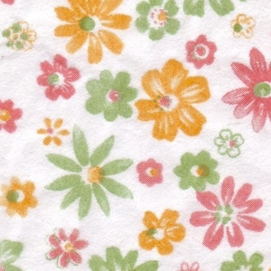 May include: A white fabric with a repeating floral pattern. The flowers are in shades of orange, green, and pink, with yellow centers. The design is a mix of different flower shapes and sizes, creating a cheerful, vintage aesthetic.