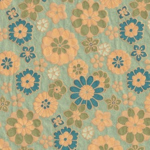 May include: A seamless pattern featuring a repeating design of stylised flowers in shades of blue, green, and orange on a light blue background.