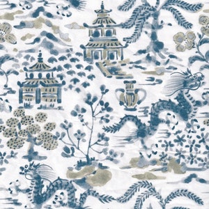 May include: A white fabric with a blue and brown repeating pattern of pagodas, dragons, and stylized trees. The design is reminiscent of traditional Chinese blue and white porcelain.