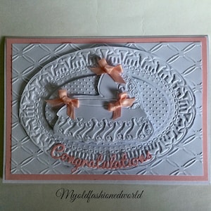 Old fashioned Romantic Vintage Style Luxury Card. New Baby Girl. Baby Shower. Featuring Crib, Pink Ribbon, Lace.