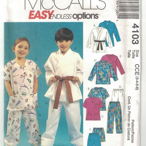 May include: McCall's 4103 sewing pattern envelope for children's clothing in sizes 3-4-5-6. The cover features illustrations of a white martial arts uniform with a brown belt, a white scrub set with dental motifs, and various tops, pants, and shorts.