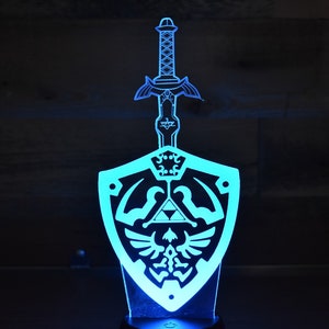 Zelda Master Sword and Shield LED sign perfect as a gift for a Zelda fans. Place in Man caves, bars, garages, desks, office.