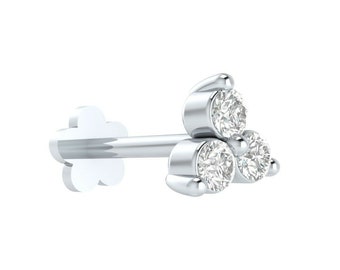 May include: A silver-toned stud earring featuring a cluster of three round, clear, faceted stones arranged in a triangular pattern. The post is straight and ends in a flat, flower-shaped backing with six rounded petals, providing a secure fit.