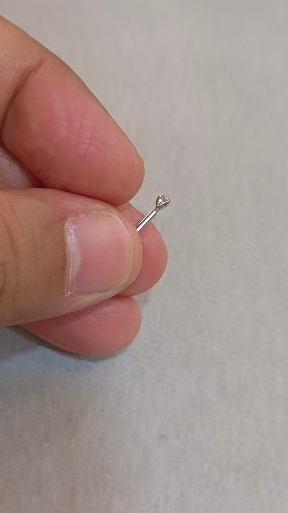 14K Yellow Gold .03 CT (2mm) Natural Diamond 22 Gauge Curved Nose Stud 14K Yellow Gold .03 CT (2mm) Natural Diamond 22 Gauge Curved Nose Stud