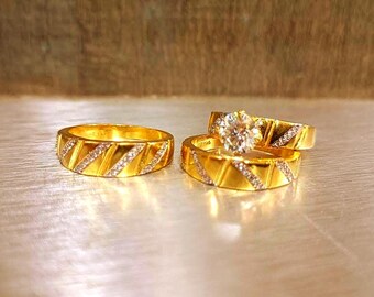 Set di fedi nuziali con tre diamanti e moissanite placcati in oro 14k