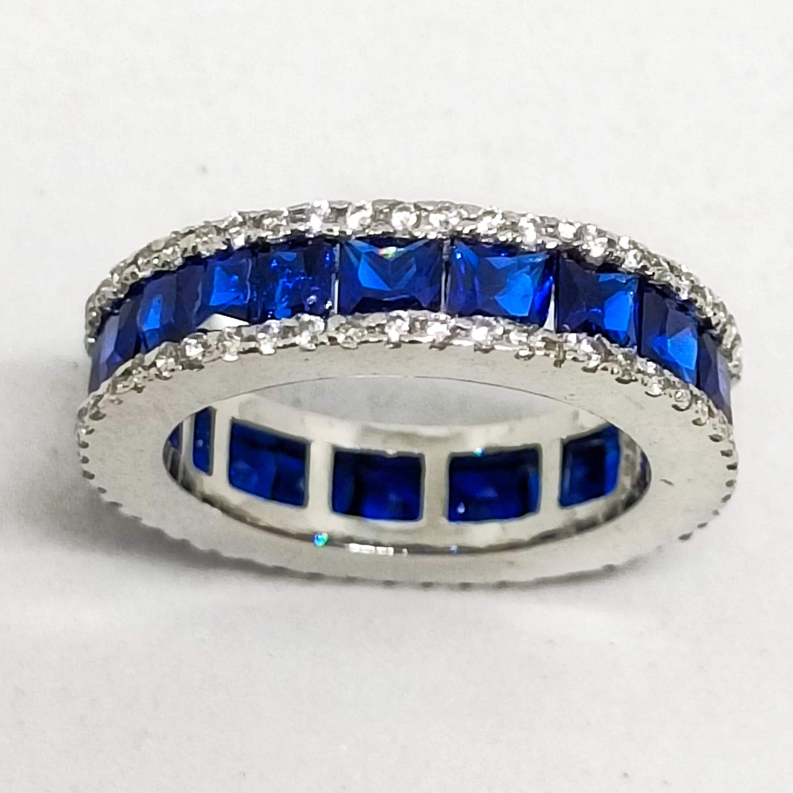 Anello Eternità In Argentium Silver 935 Con Zirconi Bianchi E Zaffiro Blu – Taglio Principessa
