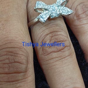 Baguette Cut Simulated Diamond Bow Ring: 14K White Gold Plated