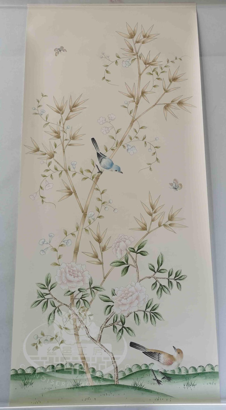 Hand-painted chinoiserie wall panels featuring bamboo, birds, and white peonies on ivory silk, custom artwork in a soft green garden landscape