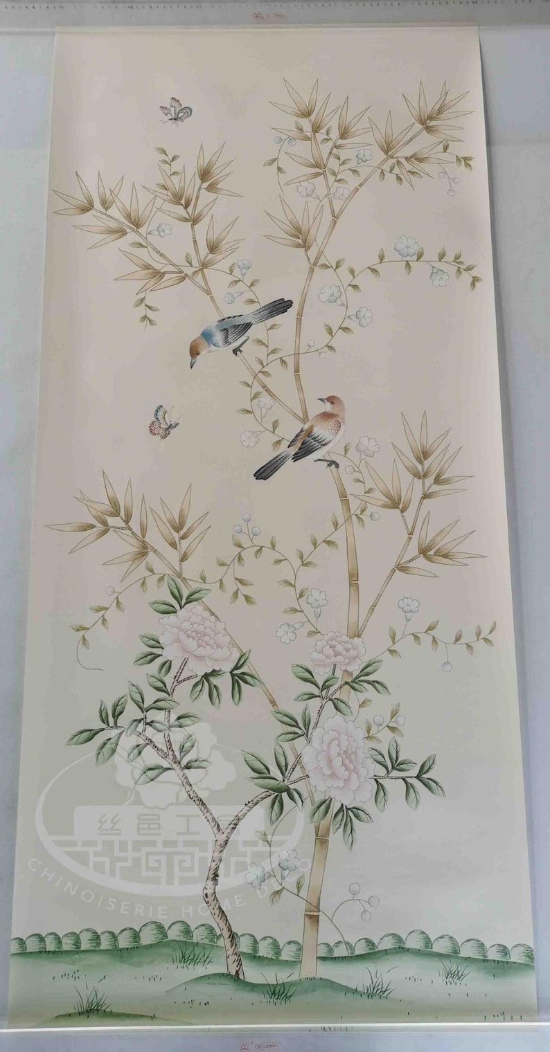 Hand-painted chinoiserie wall panels featuring bamboo, birds, and white peonies on ivory silk, custom artwork in a soft green garden landscape